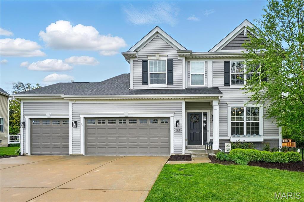 BE PREPARED TO BE IMPRESSED when you tour this STUNNING 1.5 Story Home offering 4 BEDROOMS, 2.5 BATHS & 3-CAR GARAGE * 9' Ceilings on Main Level with an Open Floor Plan & Wood Floors that flow from the Entry into the Dining, Kitchen & Breakfast Rooms * Dining Room serves as a perfect Flex Space...Home Office or Play Room * SOARING Ceiling in Great Room with Gas Fireplace opens to Kitchen featuring OVERSIZED Center Island with Overhang for Counter Stools, 42" Custom Cabinets...Staggered with Crown Mold, STAINLESS Appliances: Gas Cooktop, Built-In Double Ovens, Microwave & Dishwasher, Staggered Cabinets, GRANITE Counters & Tile Backsplash, Walk-In Pantry PLUS Butler's Pantry/Coffee Bar with Under Counter Beverage Cooler * Breakfast Room opens to Low-Rise Deck with access to Level, Usable Backyard * Main Level Primary Bedroom opens to Ensuite Bath with Double Bowl Vanity, highlighted by Custom Shiplap Accent Wall, Soaking Tub & Separate Shower and Walk-In Closet * Open Staircase to Upper Level with 3 Spacious Bedrooms, all with Walk-In Closets, Hall Bath & Bonus Room * Built-In Cubbies & Main Floor Laundry * Open Staircase to Lower Level with Egress Window and Rough-In For Bath...READY FOR FUTURE FINISH, if desired * OVERSIZED 3-Car Garage * ADD'L Features include: Zoned HVAC & Irrigation System
