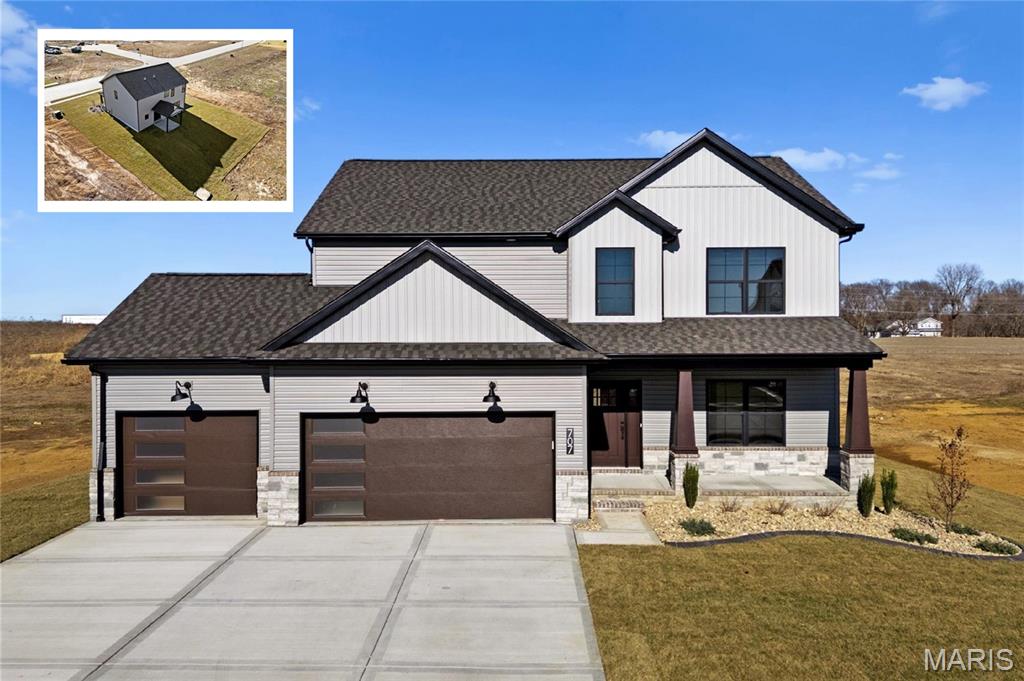 Welcome to this stunning new construction, two-story home in the highly desirable Savannah Hills community. Offering 5 bedrooms, 3.5 bathrooms, and 3,260 square feet of thoughtfully designed living space, this home showcases one of the builder’s newest and most sought-after floor plans, created to meet the needs of today’s modern families.

The main level features a spacious open-concept layout, ideal for both everyday living and entertaining. The expansive living area flows seamlessly into the kitchen and includes a separate formal dining area, perfect for hosting gatherings or special occasions. Abundant natural light and luxury vinyl plank flooring enhances the open design, creating a warm and inviting atmosphere throughout.

Upstairs, you’ll find four generously sized bedrooms, including a luxurious primary suite designed as a true retreat. The primary bath is highlighted by a spa-inspired ensuite, featuring a beautifully tiled shower, a freestanding soaking tub, dual vanities, and a massive walk-in closet offering exceptional storage and organization. Additional upper-level bedrooms provide ample space for family, guests, or home office needs. Convenient upper-level laundry room. 

The finished basement adds valuable living space and includes a fifth bedroom, full bathroom, and a large recreation area, making it ideal for entertaining, a media room, or extended-stay guests. Additional unfinished storage space.

Completing the home is a three-car garage, providing plenty of room for vehicles, storage, and recreational equipment. Situated in the growing Savannah Hills subdivision, this new construction home blends modern design, functionality, and quality craftsmanship—an excellent opportunity to own a brand-new home tailored for today’s lifestyle.