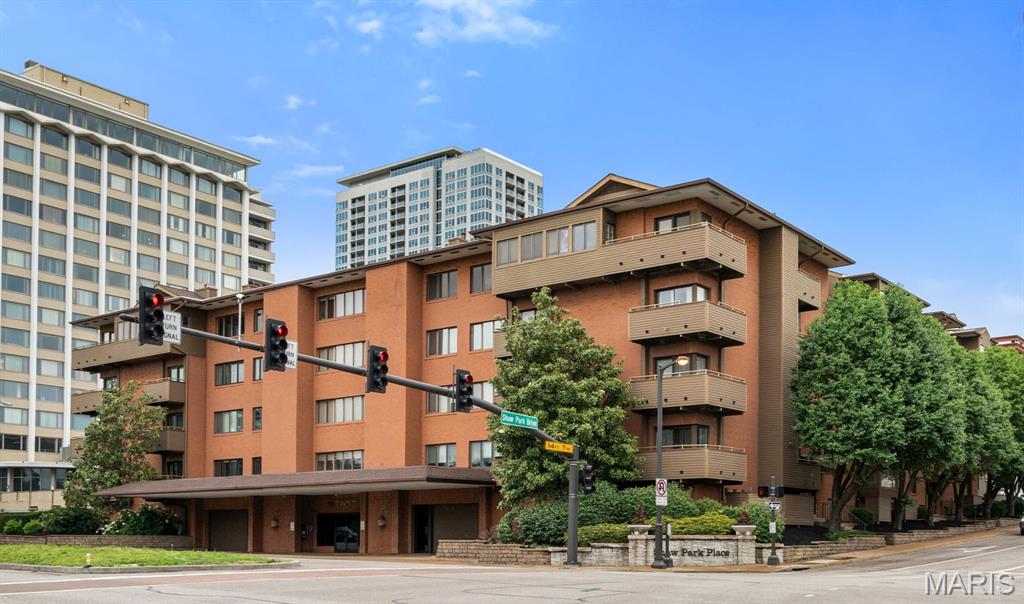 Rare opportunity to own an exceptionally spacious and affordable condo offering more than 2,200 square feet in one of Clayton’s most desirable locations. Tucked quietly in the rear of the building with east and north-facing exposures, this residence enjoys a peaceful setting filled with beautiful natural light and lovely city views from the private terraces. Designed for both comfortable everyday living and effortless entertaining, the floor plan features 3 generously sized bedrooms, 2.5 baths, expansive living and dining rooms, and a warm inviting family room complete with custom built-ins. Large windows throughout create an airy atmosphere while newer carpeting adds comfort and freshness to the living spaces. Main-floor in-unit laundry adds convenience rarely found in condo living. The location truly cannot be beat. Situated directly across from Shaw Park and within the sought-after Clayton School District, you are just steps from boutiques, Straub’s grocery store, coffee shops, and Clayton’s exceptional culinary and nightlife scene. Enjoy easy access to major highways for a quick commute while still living in the center of one of St. Louis’ most vibrant and walkable communities. This is city living with space, comfort, convenience, and value all in one.