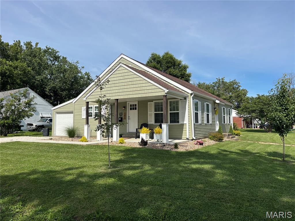 A charming single-family residence built in 1941 and fully remodeled in 2024 that is ready for you to move in and make it your own. This inviting bungalow style home offers a seamless blend of classic appeal and modern comfort, promising a serene living experience. The heart of this home, the kitchen, is equipped with sleek stainless steel appliances, creating an ideal setting for culinary exploration and everyday meals. Each of the two bathrooms is thoughtfully designed, with one featuring a convenient walk-in shower, providing a refreshing start or end to your day. Practicality meets convenience with an integrated laundry room and an attached garage, simplifying daily routines. The welcoming porch extends an invitation to relax and enjoy the surroundings. This property offers a harmonious blend of comfort and functionality, waiting for you to create new memories.