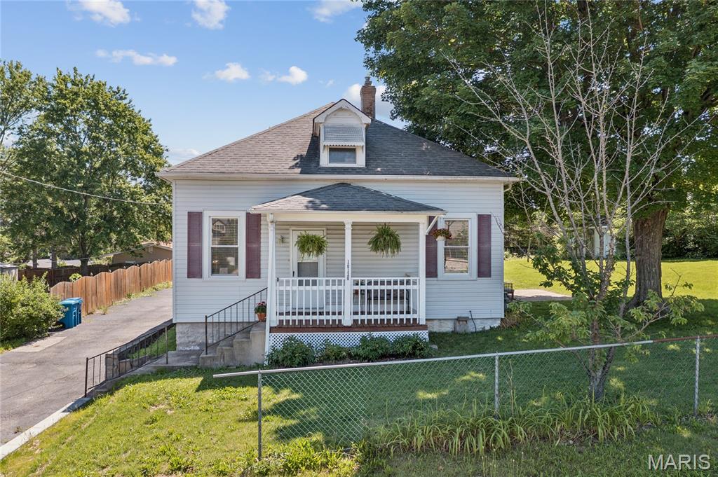 Welcome to 10130 Baptist Church Road, a charming bungalow full of timeless character set on a beautiful 0.38-acre lot in the heart of South County. Built in 1900 and thoughtfully maintained, this home pairs early twentieth-century warmth with practical updates, all within the highly sought-after Lindbergh School District.

Step inside to an inviting main level where a spacious living room flows into a separate dining room and a cozy family room. Rich luxury vinyl plank flooring runs through the main living areas, while the kitchen and full bath feature easy-care ceramic tile. The main-floor primary bedroom offers everyday comfort and convenience, and a generously sized upper-level bedroom provides flexible space for a private retreat, home office, or guest suite.

Outdoor living is where this property truly shines. Relax on the welcoming front porch, gather with friends on the patio, or unwind in the enclosed rear addition as the seasons change. The expansive, partially fenced backyard gives you room to garden, play, and entertain, and a neighborhood park just moments away keeps green space close at hand.

A full unfinished basement delivers excellent storage and real potential to expand your finished living space down the road. 

Set in the heart of South St. Louis County and served by Sappington Elementary, Truman Middle, and Lindbergh High, this home puts you minutes from the St. Louis gem, Grant's Farm or a movie night at Ronnie's! This is a rare chance to own a piece of South County charm. Schedule your private showing today and make it yours!
