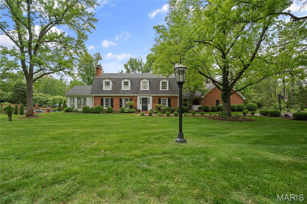 Back on market at no fault to the seller.  Welcome to your private retreat at 410 Steeplechase Lane in Frontenac. This stunning residence, with over 5800 feet of total living area, features 6 bedrooms (one used as a study) with an optional bedroom on 2nd floor, ideal for a growing family or home office needs. The main floor offers flexibility, where two spacious bedrooms could be converted into a primary suite.  The kitchen, at the center of the home with its adjoining breakfast and hearth rooms measure 42x15, allowing flexibility for entertaining and layout.  Multiple living spaces ensure everyone has a place to enjoy and makes entertaining a breeze.  Hardwood floors and a neutral color palette create a warm and inviting tone.  The lower level has additional living and flex space.  The property, encompassing over an acre, provides ample space for outdoor activities or simply relaxing on the patio or by the pool.  Location, privacy and flexibility of layout make this the perfect home.  Start living your best life today!