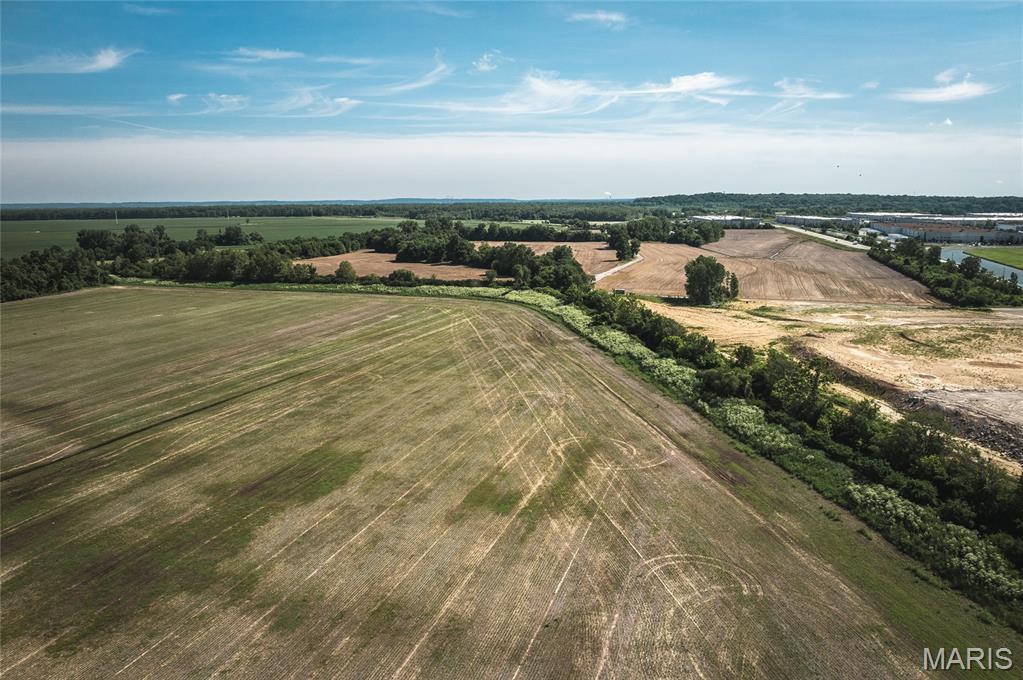 60.15 +/- acre investment and development opportunity in a prime St. Louis County location. Featuring productive tillable acreage, significant highway visibility, and income-producing billboard assets, this property offers a unique combination of current utility and future upside.

Positioned along Missouri Bottom Road and highly visible from Highway 370, the property is exposed to more than 20,000 vehicles daily. The eastern portion of the tract includes two existing billboards, creating an additional revenue stream while providing outstanding advertising exposure.

The property's size, visibility, and strategic location within an expanding commercial and industrial corridor make it well-suited for a variety of future uses. Whether utilized for agricultural production, long-term investment, or future development, this tract offers substantial potential in a rapidly growing area.