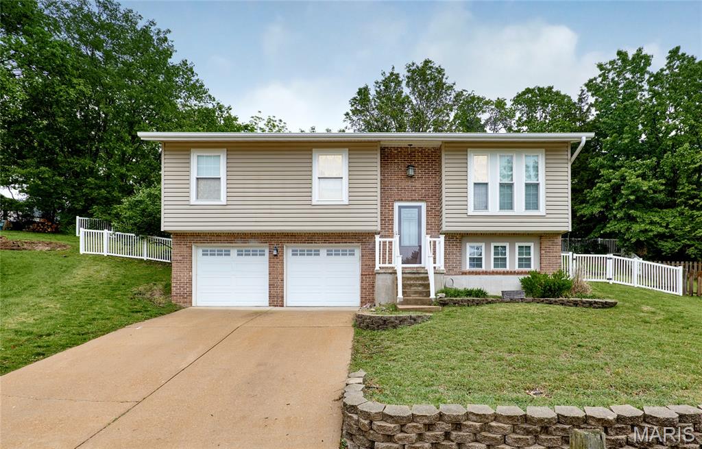 A rare find! Beautiful 3 bedroom 2 bath split level on a tree lined cul-de-sac is waiting for new tenants to call it home. Step inside this recently updated home and take note of the open and spacious floor plan, abundance of natural light, new carpeting, and fresh paint. The remodeled Kitchen with custom white cabinets, stainless appliance package, and luxury laminate wood flooring opens up to a separate dining room that flows into the living room. The lower level is finished with a family room, and lots of space for storage. All bedrooms include custom closet built-ins, and bathrooms have tiled floors, marble vanity tops and tub surround. The large back patio, overlooking the partially fenced yard is perfect for summer BBQ's with family and friends. Easy access to Hwys, schools, shopping, and parks. Pets require approval and additional fees. Hurry, don't miss the chance to move into this highly desired Mehlville location!