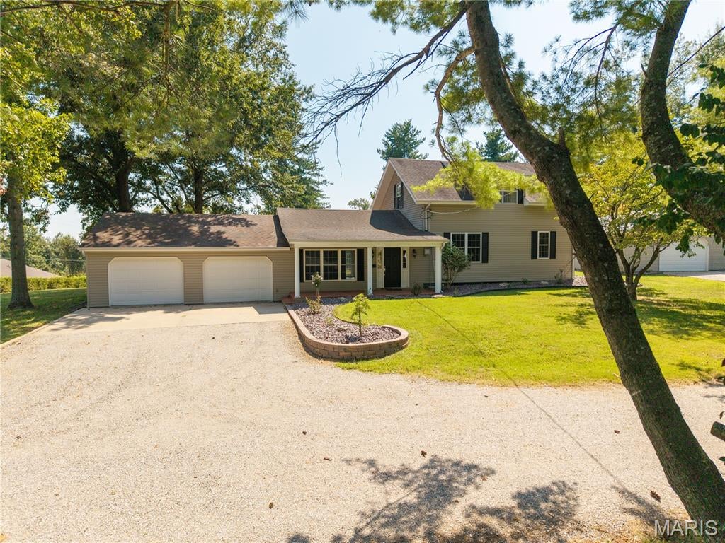 Located on a dead end street this 3 bedroom, 2 bathroom home offers over 1,800 sq ft of living space. This home checks a lot of boxes including main level laundry, attached two car garage, and a spacious kitchen with new appliances. This home sits on 1.27 shaded acres with a detached 28x26 insulated shop that features a 1/2 bath. Close to the amenities of Perry county with room for your family, pets, and friends to spread out.