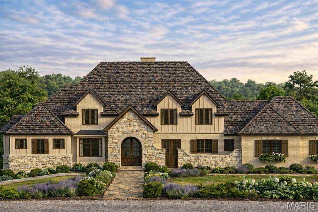To Be Built  - Imagine your amazing estate set on 18+ acres of rare hilltop. This offering presents a level of privacy, scale, and natural beauty rarely available this close to all amenities and the conveniences of West St. Louis County. The homesite sits high and secluded, surrounded by mature trees and long views, creating a true estate setting where architecture can breathe and design can be fully expressed.
Lauren Strutman Architects brings a French-inspired design defined by proportion, craftsmanship, and refined scale—modern yet enduring. Known for timeless residential work that blends proportion, craftsmanship, and livability, Lauren’s portfolio spans decades of custom homes across St. Louis’ most prestigious neighborhoods. 
Artisan Homes, led by Tom Roberts, is known for meticulous craftsmanship and architectural sensitivity. His intentional, precise work creates homes built to last. Their collaboration offers a rare opportunity to build a residence of exceptional integrity.
The attached plan reflects a luxury, estate level layout with expansive gathering spaces, a main level primary suite, and seamless indoor–outdoor flow. Final interior selections are intentionally left open, allowing you to complete the home’s specifications to your preferred level of finish; from artisan cabinetry and natural stone to designer lighting and bespoke millwork. This flexibility ensures the finished residence reflects your personal vision. 
Non urban zoning provides exceptional long term value and versatility, supporting a wide range of uses while preserving the privacy and natural buffer that make this acreage so extraordinary. Despite the seclusion, the property remains minutes from major highways, Chesterfield Valley, top rated schools, dining, retail, and everyday amenities.
This is a rare opportunity to build on one of the very few Non Urban zoned private large lots left in St. Louis County. Land that fully supports a luxury residence of this caliber, paired with an architect and builder whose work is synonymous with enduring design and elevated execution. You may use the preferred builder and architectural plans or bring your own. - See Residential Lot listing MLS 26028269