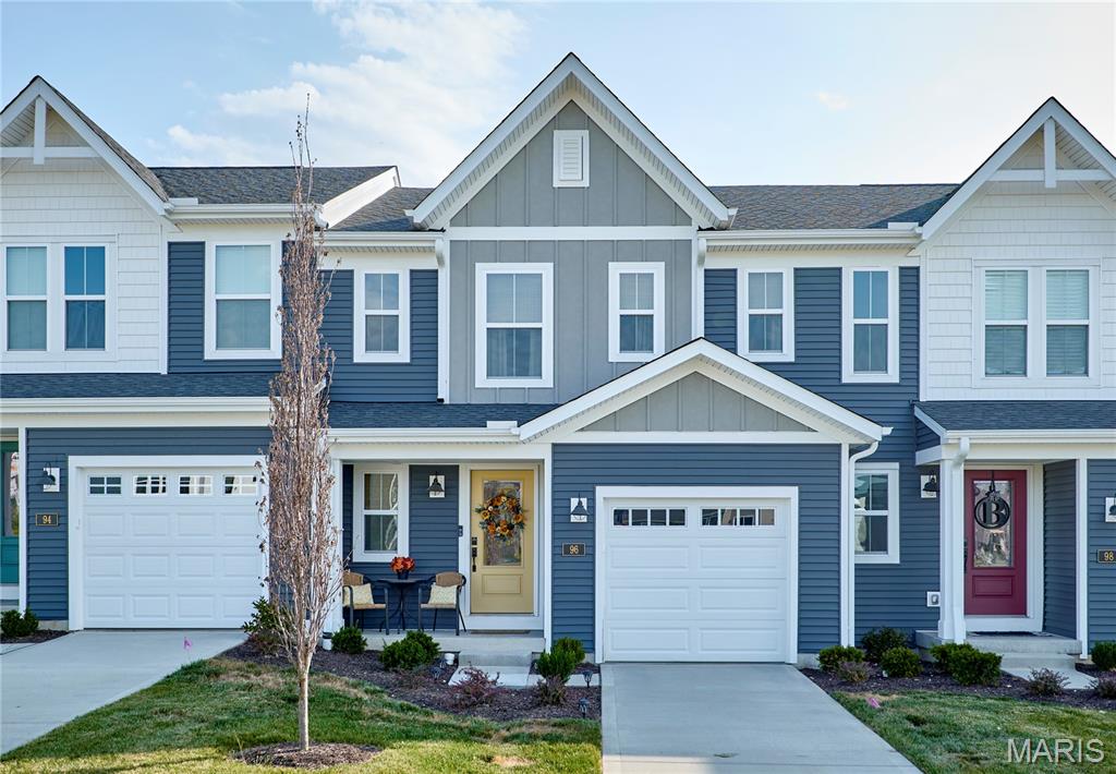 BETTER THAN NEW! This gorgeous 4-month-old Fischer Homes Durham townhome offers the best of both worlds—brand-new construction with the added benefit of thoughtful seller improvements already completed! Located in the highly desirable Townes at Streets of Caledonia, this move-in-ready home features an open-concept design, stylish finishes, abundant natural light, and an impressive list of community amenities. The main level offers a spacious, open floor plan designed for everyday living and entertaining. The beautifully appointed kitchen features an oversized island, stainless-steel appliances, upgraded cabinetry with 42-inch upper cabinets, soft-close hinges, and plenty of workspace. The kitchen opens seamlessly to the family room, now enhanced with a custom fireplace wall and wood décor added by the seller—creating a warm and inviting focal point. Retreat Upstairs to the spacious primary suite features a private en-suite bath with double-bowl vanity, complemented by updated primary bath mirrors. Two additional bedrooms, a centrally located full hall bath, and a convenient second-floor laundry closet provide an ideal layout for family, guests, or a home office. The full unfinished basement provides excellent storage and future finishing potential, with a full-bath rough-in already in place. An attached one-car garage adds convenience and additional storage. Seller improvements include custom fireplace wall/wood décor, window blinds, upgraded primary bath mirrors, and an added kitchen island—giving this home a finished, personalized feel without the wait and hassle of new construction. Enjoy an exceptional lifestyle at The Townes at Streets of Caledonia with outstanding on-site amenities including a resort-style swimming pool and children's splash area, clubhouse with gathering spaces and full kitchen, fitness center, pickleball courts, bocce ball, playground, covered pavilions, gazebos, walking trails, lakes, fountains, and extensive scenic common ground. Conveniently located near O'Day Park, Busch Memorial Conservation Area, Missouri Rush Sports Park, shopping, restaurants, and entertainment at The Shoppes at Hawk Ridge, Dardenne Town Square, and The Meadows at Lake Saint Louis. Located in the award-winning Wentzville School District with easy access to I-64/40 and Highway DD. Why wait for new construction when you can have a nearly new home that's already enhanced, decorated, and ready to enjoy? Schedule your showing today!