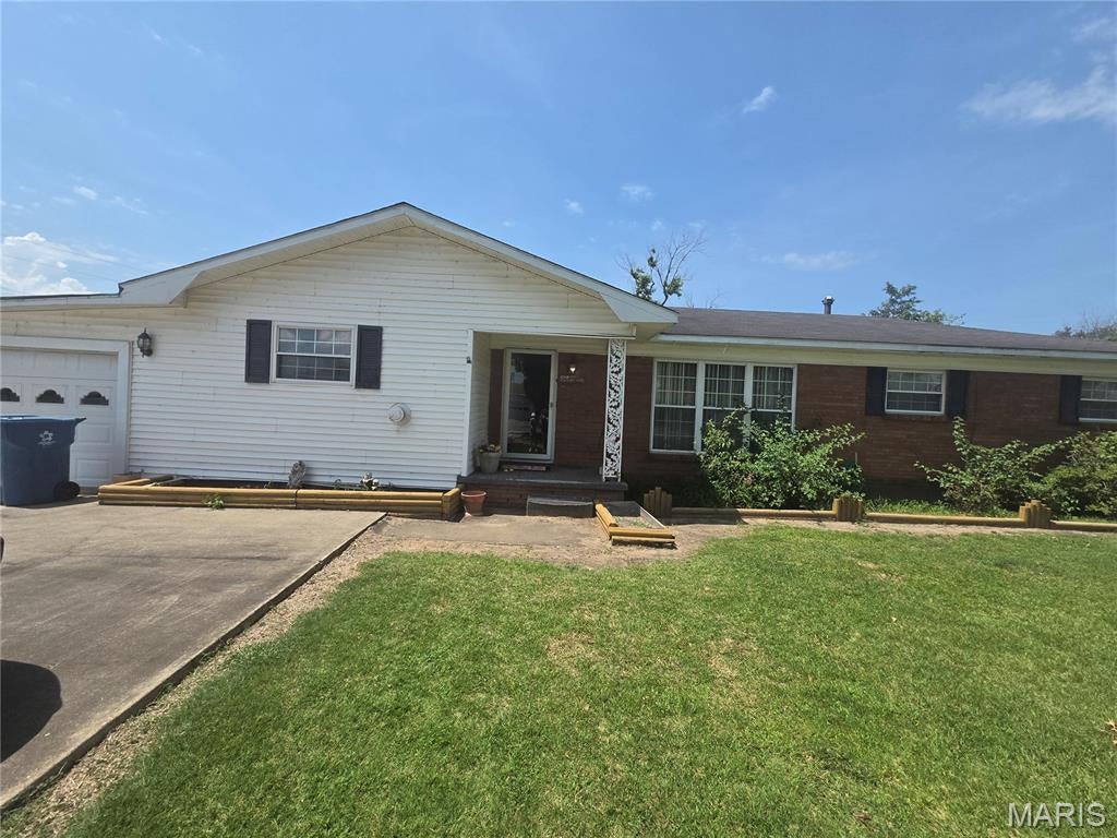 This 1-story home offers 1800 sq ft of space, a 1-car attached garage, public water & sewer, and NO HOA fees. Appliances included with the property are a refrigerator, stove, dishwasher, and a bonus large freezer located in the garage. The roof is intact with no leaks. A solid option ready for a new owner's personal touch and cosmetic updates.