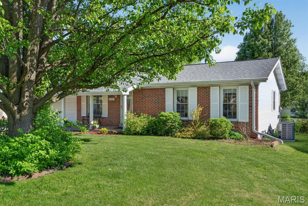 Refreshed and ready to go!! Discover this delightful ranch in the peaceful community-focused Tam O’Shanter subdivision, featuring a neighborhood pool, park, and scenic lake. The heart of the home is a stunning, expansive eat-in kitchen that flows seamlessly to a large covered patio through sliding glass doors—the ultimate setup for entertaining. The spacious, level backyard is perfect for pets or weekend games. Downstairs, you’ll find a finished lower level, while the oversized, temperature-controlled garage makes home projects a breeze. With a new kitchen, new roof and siding, new a/c, and new LVP in the lower level, this home is truly move-in ready! Located in the top-rated Oakville School District with an easy commute to downtown St. Louis.