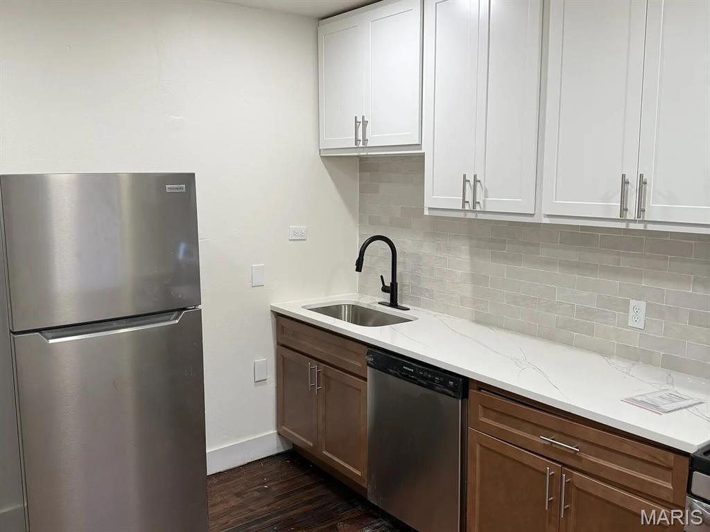 Don't miss this incredible opportunity to own a spacious 4-bedroom, 2 full-bath home! Originally a two-family property, this home has been thoughtfully converted into one large single-family residence, offering plenty of room to spread out. This home has beautiful hardwood floors flow throughout much of the home, while the generously sized bedrooms provide comfort for the whole family. Major updates include two gas forced-air furnaces and updated electrical, offering added peace of mind. The full basement provides abundant storage or the potential for additional living space. Whether you're looking for room to grow or simply appreciate the character and space of a larger home, this one is a must-see!