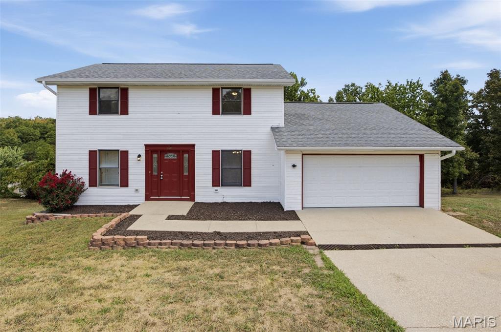 This beautifully updated 3 bedroom, 3 bathroom home is conveniently located just minutes from the main gate of Fort Leonard Wood and close to Freedom Elementary School. The main level offers a spacious living room, eat-in kitchen, dining area, bathroom, access to the 2-car garage and a comfortable family room featuring a beautiful wood-burning fireplace. The completely renovated kitchen offers modern finishes and backsplash, with access to the large rear deck—perfect for entertaining or relaxing. The upper level features the primary suite, two additional bedrooms and a full guest bathroom. The basement provides excellent future potential and is already framed with electrical in place, allowing for an easy conversion to additional finished living space. With the basement completed, the home could offer up to 5 bedrooms and 3.5 bathrooms. The basement also includes a large storm shelter with steel beams and electric, providing valuable peace of mind during severe weather. Completely redone from top to bottom and ready for its new owners, this home offers space, updates and tremendous potential in a fantastic location!