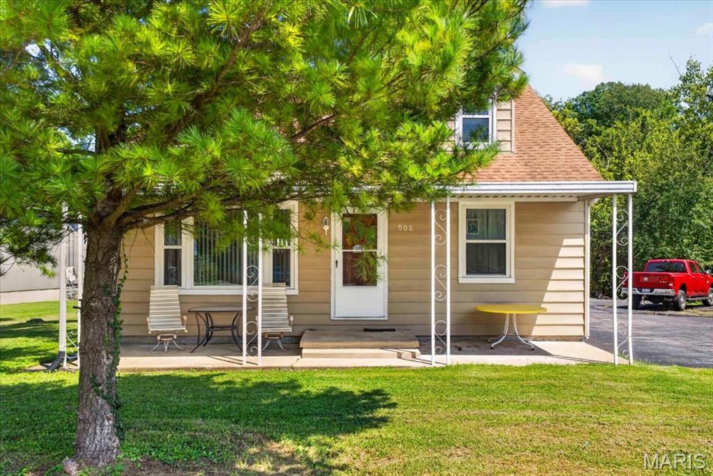 Discover the perfect blend of comfort and convenience in this incredible residential/commercial property! Situated on Main Street, you're steps away from grocery stores, restaurants, and a scenic walking path, with quick access to Route 3 for effortless commutes to St. Louis or Waterloo. The invited 3-bed, 2-bath home features a stunning, updated kitchen with loads of wood custom cabinetry with crown molding, laminate countertops, and stainless steel appliances, newly finished wood floors, and a private primary suite on the main level with updated bathroom features. A spacious commercial shop connected to the back of the home through the enclosed breezeway, complete with a half bath and double-door access, offers endless business possibilities. Plus, a creek runs right through the property adding to its unique charm! This is a duplicate listing of MLS # 26053491.