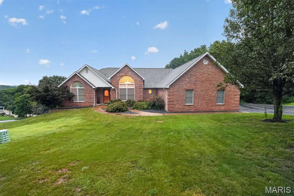 Welcome to this spacious 2,607-square-foot single-family home situated on 2.63 acres in Festus. Built in 2001, the property offers a comfortable blend of indoor living space and generous outdoor acreage. The expansive lot provides plenty of room to enjoy the surrounding setting, while the home's well-designed layout offers flexibility for everyday living and entertaining. With its combination of space, privacy, and a convenient Festus location, this property presents a wonderful opportunity to enjoy acreage living while remaining within easy reach of local shopping, dining, schools, and major roadways.