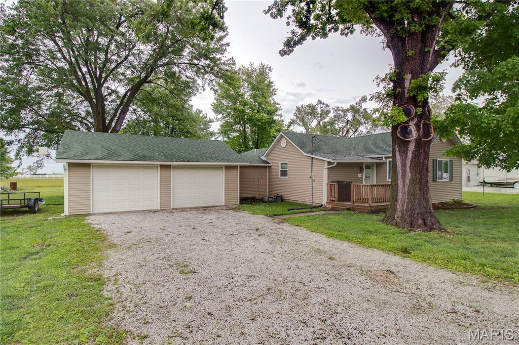 Welcome to this well-maintained 3-bedroom home in Medora! This home features a spacious eat-in kitchen with walk in pantry. (All appliances included)  The cozy living room with a wood-burning fireplace offers the perfect place to unwind. Convenient main floor laundry room and utility room. The oversized two-car attached garage offers plenty of parking and storage space. The large lot with a shed provides extra room for storage or outdoor enjoyment. Many updates throughout—this one is move-in ready.
