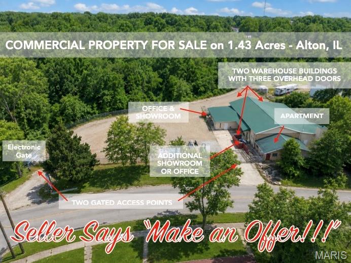 Large commercial / industrial building with gated 1.43 acre lot. Property would be ideal for self-storage units, RV & boat storage, heavy equipment, showroom, industrial, manufacturing, and more!!  Large office space currently rented by Alton Fence, two large warehouse spaces with overhead doors, office space with 1/2 bathroom. Two overhead garage doors, 12.2x11 and 16x10.6, both insulated w/ jack shaft operators. There is also a spacious 5 room "non-complaint" apartment with a FULL KITCHEN & bathroom. (Appliances are negotiable.) New roof trusses and metal roof installed approximately 10 years ago- buyer to verify. Three parcels are included: 23-2-07-02-18-302-02; 23-2-07-02-18-302-001; 23-2-07-02-18-302-004. SEE ATTACHMENTS & SURVEY. DO NOT ENTER parking lot or buildings without a confirmed appointment. Proof of cash funds or Pre-Qualification Letter is required to schedule a showing appointment. Listing Agent is related to seller. SOLD AS IS. No inventory or equipment is included. Location: City