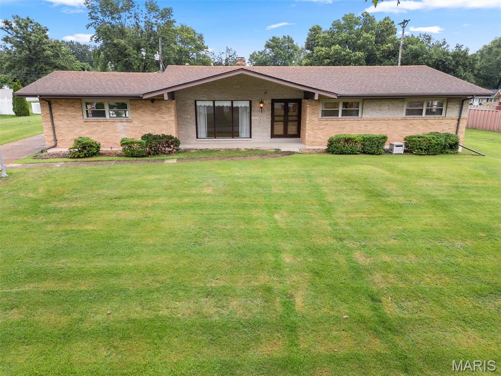 This rambling ranch on almost 1/2 acre of flat yard.  Located in a quiet cul da sac, this true 4 bedroom home is ready for your turn at making it a beauty.  Most rooms have wood floors under the carpet.  All the room are large and have oversized windows for natural light. The kitchen is a large eat in style with window over the sink that looks out into the wonderful backyard The family room boast a masonry fireplace.  Full basement has a 3rd full bath.  Quaint finishes and interest and character  in the rec room space.  Additional storage area as .well.  2 car attached garage.  All this within walking distance of  the award winning Lindbergh School system.  Don't miss your change to grab a good one for your family to grow into