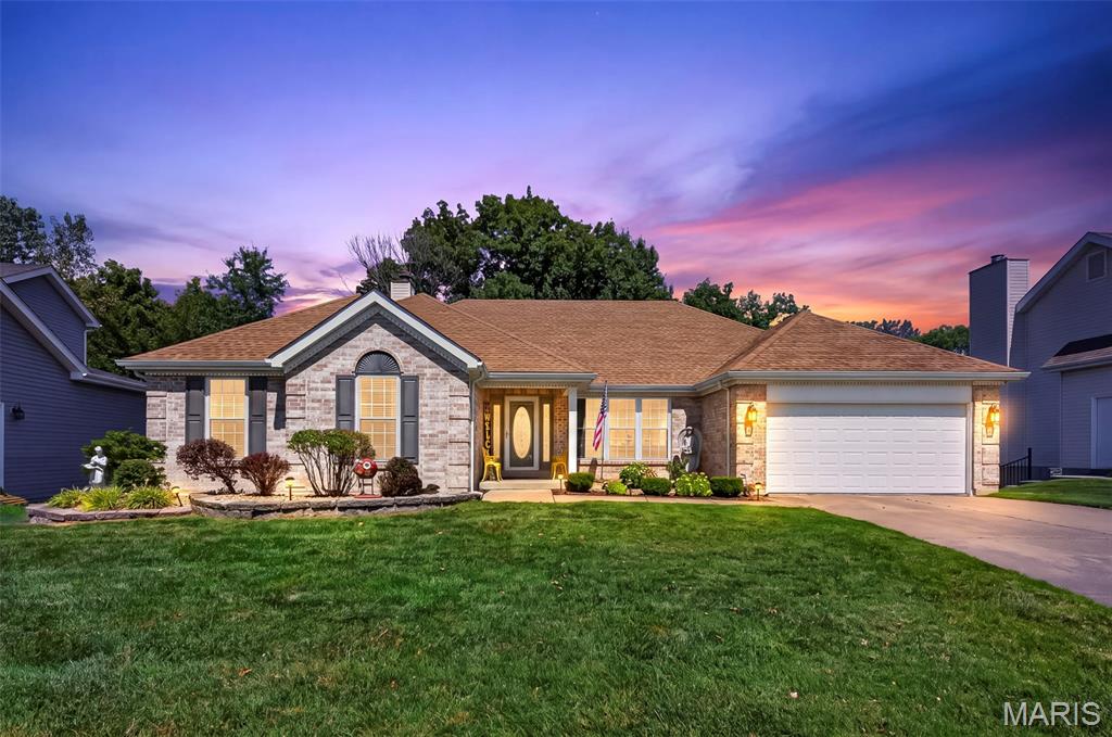 LOOK AT THIS! A Beautiful 4BR/3BA atrium ranch backing to mature timber! Newly replaced atrium windows fill the home with natural light and showcase gorgeous wooded views. The main level features a spacious great room with a dramatic floor-to-ceiling brick wood-burning fireplace, a separate hearth room with natural gas fireplace, formal dining room, and an updated kitchen with custom cabinetry, granite countertops, tile backsplash, breakfast bar, stainless appliances, pantry, and breakfast area.

The primary suite offers a private bath with custom cabinetry, double-sink vanity, jetted tub, and separate shower, with two additional bedrooms and a full bath completing the main level. Downstairs, the finished lower level provides a large family room, private office, 4th bedroom, and 3rd full bath. There is a large storage room as well. 

Outside, enjoy the wooded setting from the composite deck and extended patio, plus a covered front porch, attractive brick-front exterior, landscaping, and 2-car garage. With two fireplaces, multiple living spaces, beautiful atrium windows, and peaceful timber views, this home offers the space and setting you’ve been looking for!