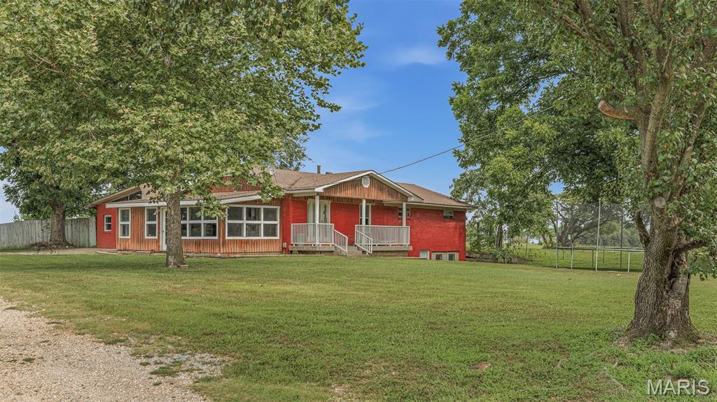 If you have been dreaming of owning your own land with a spacious home, check this out!! This unique property is nestled on 5.30 acres m/l of land & surrounded by hundreds of acres of wooded land and farmland. The home features over 2700 Square feet of living space and a 760 Square foot basement! This beautifully updated home features 4 bedrooms 3 bathrooms, a large mudroom/sunroom, 2 living areas, large dining space & large kitchen. The sunroom has the most amazing views of the land. The panoramic views of the sunsets are amazing. You can take in views of wildlife right out your own window.
Property also has a 6 stall barn, a grain bin & privacy fence off the back of the house. Located in Malden school district with a Bernie address. Approximately 10 minutes from Dexter, 15 minutes from Malden, 12 minutes from Campbell & 40 minutes from Kennett.
Properties like this do not come up often! Now is the time to buy your own country oasis! Call today for a tour of this beautiful property!