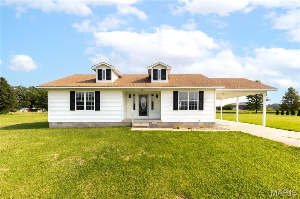 Welcome to 180 Luke Morgan Lane in East Prairie! Sitting on approximately 1.05 acres, this 2 bedroom, 1 bath home offers 1200 square feet of comfortable living space and endless potential. Built in 2009, this updated home features a functional layout, a spacious living area, an eat-in kitchen with new appliances, a large newly renovated bathroom, and a covered carport. Enjoy peaceful country-style living with plenty of outdoor space for entertaining, gardening, or future  home additions. Whether you're a first time home buyer, or just looking for the perfect location, this property offers a solid foundation to make it your own. This home is conveniently located just minutes from town while providing privacy and space outside city limits.