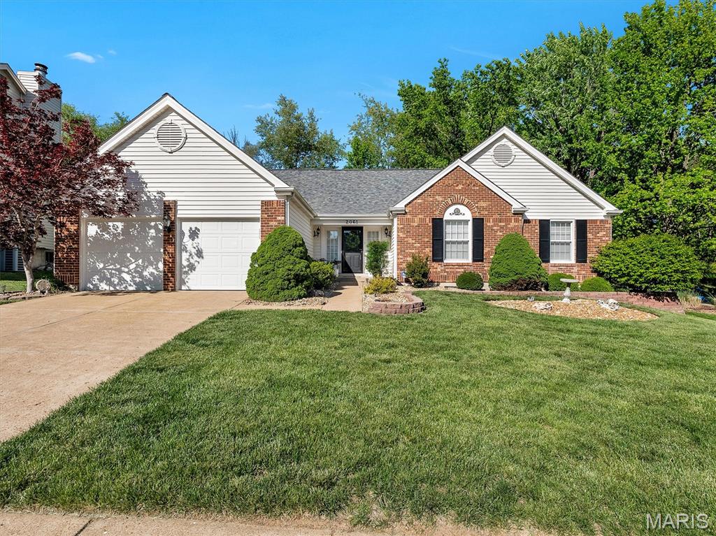 Welcome to this beautifully updated ranch in the sought-after Woodfield subdivision. This 3-bed, 3-bath home offers over 1,700 sq ft on the main level with a bright, open layout and timeless finishes. The vaulted living room features a gorgeous brick, wood-burning fireplace and flows seamlessly into the kitchen and breakfast room—perfect for everyday living and entertaining. The main floor includes a dedicated office, convenient main-level laundry, central vac system, a spacious primary suite with walk-in closet, and two additional bedrooms with generous size and natural light. The finished lower level expands your living space with a media room, recreation area, full bath, and multiple storage rooms. Outside, enjoy a private, park-like lot with mature trees and an attached 2-car garage. Thoughtful updates throughout blend comfort and style in a fantastic St. Charles location near parks, shopping, and more! Don't miss out on this one!