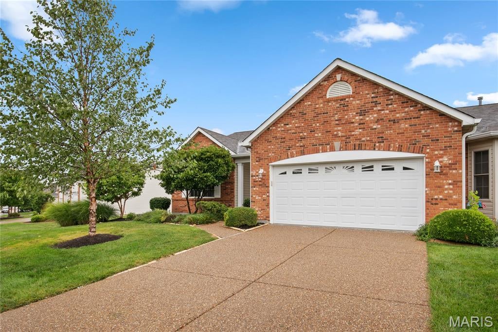 Amazing renovation just completed on this 4 bedroom, 3 bath villa with a finished basement! So many updates throughout! Brick front elevation and covered front porch will greet you as you enter. All new LVP flooring running through most of the main level including all bedrooms! Updated kitchen features refinished cabinets, new granite countertops with bar stool seating, new stainless appliances, and new cabinet hardware! Adjacent main floor laundry leads with additional storage leads to a 2 car attached garage! Elevated screened in porch with all new screens and freshly painted! Primary bedroom suite offers large walk in closet, updated bath with new vanity, flooring and toilet, and all new fixtures. Walkout lower level with tall ceiling height features lots of natural sunlight through egress windows and walkout door! Full wetbar with new wine fridge! Updated lower level bath, brand new carpet throughout finished lower level! Additional lower level bedroom with spacious walk in closet! Tons of storage space in unfinished portion of lower level! Additional features include brand new HVAC system, new water heater, new premium height baseboards, all new door hinges and hardware, new light and plumbing fixtures, and so much more! Amazing community with pool and most exterior maintenance covered by HOA! Great location within minutes of shopping, schools, highways and so much more! This is truly a must-see home and is available for immediate occupancy!