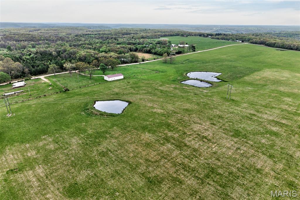 Discover 100 acres of exceptional farmland offering the ideal setting for a working cattle operation, hobby farm, or future homestead. The property is fully fenced and includes a well, electricity, and a 40’ x 80’ machine shed with a loft, providing ample space for equipment, hay, and storage. Gently rolling pasture offers excellent grazing potential with room to expand your agricultural operation. Conveniently located with easy access to Jerome and the Gasconade River access, while remaining just a short drive to Rolla and Fort Leonard Wood. Whether you’re looking to grow your livestock operation, build your dream home, or invest in quality Missouri farmland, this property offers endless possibilities. Acreage of this size and quality is becoming increasingly difficult to find.