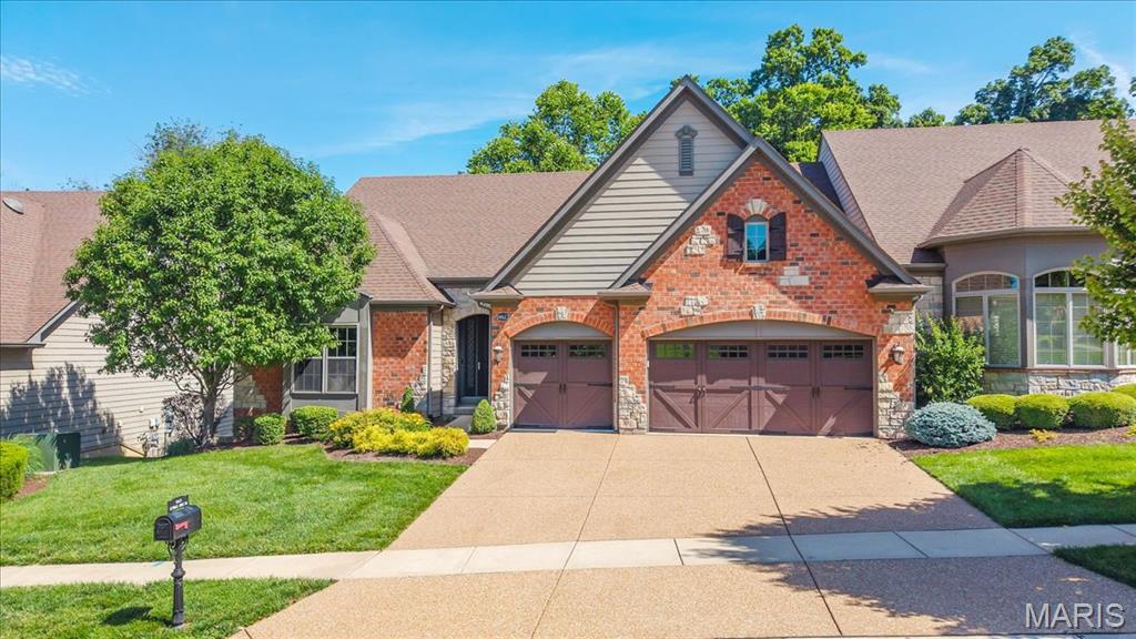 Welcome to the Villages of Kendall Bluff, a highly sought-after gated community offering low-maintenance luxury living in the heart of Chesterfield! This rare Fischer & Frichtel 4-bedroom, 2.5-bath villa showcases an open floor plan, soaring 12-foot ceilings, and a 3-car garage, equipped with a 220V outlet for charging your electric vehicle. Hand-scraped hardwood floors span most of the main level, highlighted by a dramatic great room with transom windows and a gas fireplace.
The gourmet kitchen is designed to impress with stainless steel appliances, double ovens, gas cooktop, granite countertops, breakfast bar, tile backsplash, and a generous walk-in pantry. Just off the kitchen, a screened-in porch provides the perfect spot for relaxing or entertaining. The gracious dining room is ideal for hosting gatherings, while a custom bar with wine/beverage refrigerator adds a special touch for entertaining.
The main-level primary suite features a tray ceiling and a luxury bath with dual vanities, walk-in shower, soaking tub, and walk-in closet—plus a Toto toilet with bidet and heated seat for added comfort. Bedroom two on the main level, currently used as a piano room, includes a walk-in closet and is conveniently located next to the powder room, offering excellent flexibility.
The finished walk-out lower level expands the living space with a large recreation room, two spacious bedrooms—both with walk-in closets—and a full bath. One lower-level bedroom is currently used as a home office, ideal for today’s flexible lifestyle.
Additional features include a utility sink in the laundry room, Beam central vacuum system, lawn irrigation system, and a roof replaced in fall 2022. Conveniently located near shopping, dining, and all that Chesterfield has to offer—this exceptional villa combines luxury, thoughtful upgrades, and unmatched convenience.