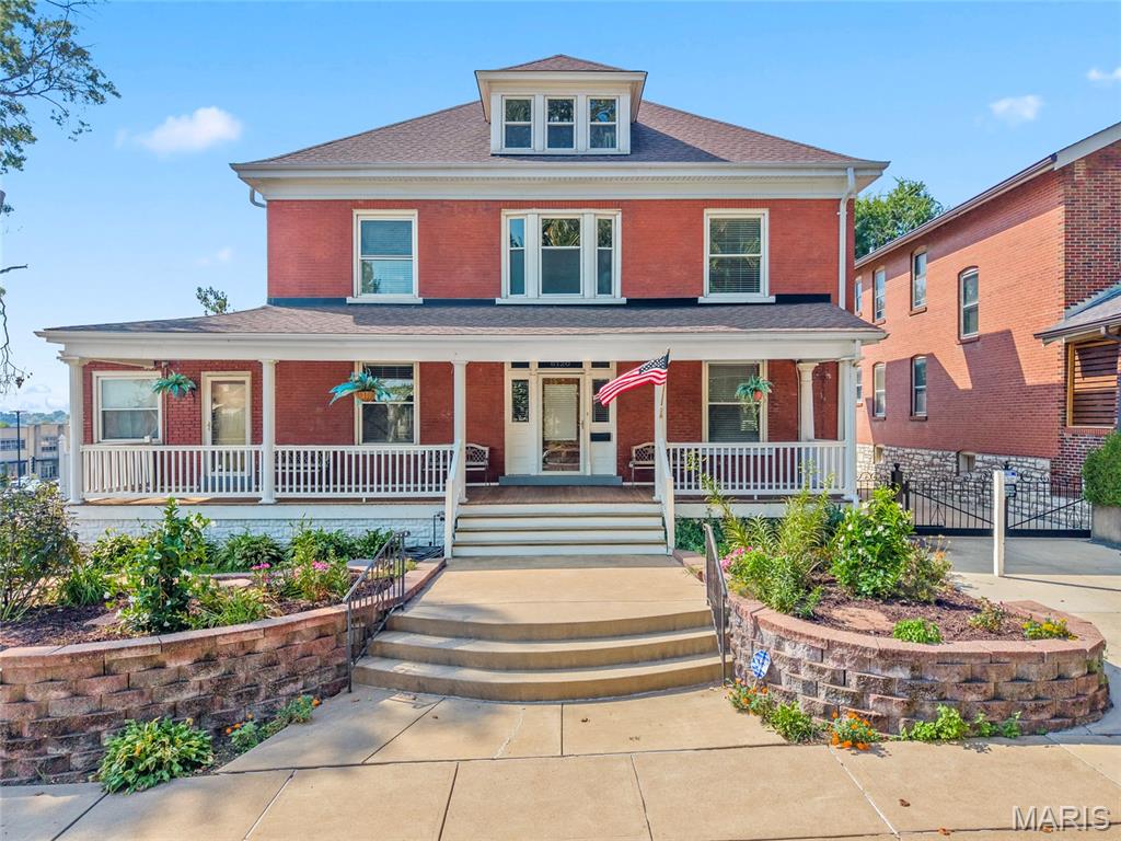 A HOME YOU WON’T WANT TO PASS BY!
Welcome to this beautiful 2.5-story brick home offering approximately 3,400 square feet, 5 bedrooms and 5.5 baths, conveniently located near the hospital, St. Louis Zoo, and Forest Park. From the moment you arrive, the welcoming covered front porch, landscaped front yard, and timeless brick exterior set the tone for what awaits inside.
Step inside and you’ll discover the character and craftsmanship that make this home truly special. Custom woodwork, high ceilings, and spacious rooms create a warm and inviting atmosphere throughout. The home also features two laundry rooms, adding convenience and functionality for a busy household.
One of the standout features is the incredible multi-season room, complete with its own separate heating and cooling system and an irrigation system to keep the plants thriving. Just off the room is a wine cellar—perfect for entertaining or enjoying a quiet evening at home.
The full basement is exceptionally clean and offers abundant storage and additional possibilities. Outside, a private gated driveway leads to an oversized three-car garage with a convenient service door.
The rear of the property is made for entertaining, featuring a natural-gas BBQ, beautiful stone bench, and stone table—perfect for gatherings with family and friends. The landscaped front yard also has an irrigation system for easy maintenance.
  A newer roof adds peace of mind, while the many custom details throughout give this home a personality all its own.

There is simply too much to list! Come see the craftsmanship, character, spacious rooms, and unique features for yourself. This is one home you definitely don’t want to drive by floor plans coming    Just wait until you see this home.  You will be ready to schedule your viewing