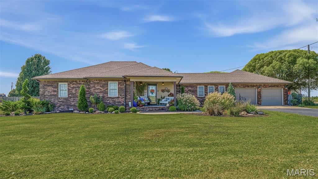 Prepare to be captivated by this show- stopping estate! It is situated on 3.22 Acres of pristine, private land. This unique property seamlessly blends modern luxury with acreage, breathtaking sunset views and tranquility! The main home features 3 bedrooms/ 3 bathrooms with over 2300 Square feet of gorgeous living space. The interior has been meticulously updated with high-end finishes including a chef-inspired kitchen, spa-like primary suite & premium modern fixtures throughout. The sophisticated design of this home is only half the story! Outside you will step into your own private oasis. The expansive custom-built deck and patio will be your front row seat to the unobstructed Panoramic sunset views of the wide-open country. The sparkling pool is sure to be your favorite summertime hangout! There is a storm shelter in the garage which provides safety & peace of mind. Also includes a manufactured home with over 1100 square feet of living space. It is perfect for rental income or a little hunting lodge of your own, right in your back yard! Also includes a 3200 Square foot shop & a 1245 Square foot shop building with 2 bay doors. This is more than a home; it is a lifestyle! If you are looking for privacy, modern luxury & breathtaking views, call today to schedule your private tour!