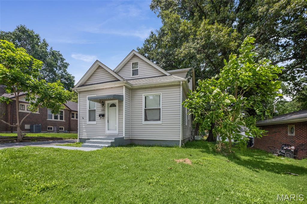 Welcome home to this recently remodeled 4 bedroom 2 bath home! There are so many features to love - tall ceilings, beautiful original staircase and original wood features, yet updated to modern efficiency. The kitchen comes equipped with all appliances, most of them new, including a dishwasher and refrigerator with ice maker. The primary bedroom is on the main level, and 3 other bedrooms, bonus rooms or office spaces, are upstairs. We think you will end up spending a lot of time on the amazing, 20x20 covered back deck, that has electric outlets already installed. The basement is great for storage, but also has a brand new full bath, and has space for a family rec room or office as well. To complete the package, the fully fenced backyard and storage shed are there for your outdoor use and convenience. Passed city occupancy inspection, and home warranty offered. Arrange your private showing today!