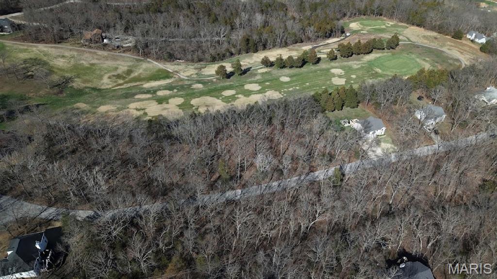 Double Lot — on the Golf Course! Near The Big Lake, Big Houses, & Beautiful New Construction! Check out this prime oversized lot perfect for a builders package infinite possibilities! In addition these golf lots have utilities on site! Buy as an individual lot for lake access or check out the neighboring golf course lots to purchase as a package and save, save, save! These ready-to-build home sites and buildable lots are located in this private, gated, resort-style community with breathtaking views four lakes, a white, sandy beach area, golf course, campgrounds, swimming pool, fitness center, and more. Perfect for builders planning to build several homes at once or to anyone seeking a peaceful, recreational lifestyle away from St. Louis, but still very close for easy family visits. Also perfect for get-away lake home. Enjoy the golf course, lake, boating, fishing, clubhouse, pool, etc. ! Just 20 minutes from The Heart of Saint Louis! 

Builders Package:

Developers Paradise: 
This includes 9563 & 9569 Bent Tree (double Lot) right on the golf course! 

More lots similar available! Schedule your showing today and start building your custom home or two homes on this double lot today!