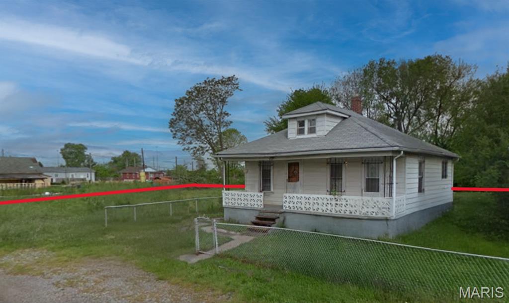 Solid 2-bedroom, 2-bath ranch home featuring a garage and situated on three land lots, providing additional space and privacy. This property presents a strong opportunity for investors or buyers looking for their next project. The property is being offered as a cash sale only, with no contingencies accepted, and is sold strictly as-is, where-is. No interior showings will be permitted, no additional interior photos are available, and interior access for inspections will not be granted. No survey or keys will be provided. All listing information is deemed reliable but not guaranteed, and buyers are responsible for completing their own due diligence prior to submitting an offer. Buyers must independently verify all property details, including but not limited to the number of bedrooms and bathrooms, square footage, room sizes, lot dimensions, and any other relevant information. Photos and marketing remarks are provided for reference purposes only. By submitting an offer, the buyer acknowledges they have independently investigated the property and are making their purchase decision based solely on their own findings. Buyer or buyer's agent to verify all MLS info