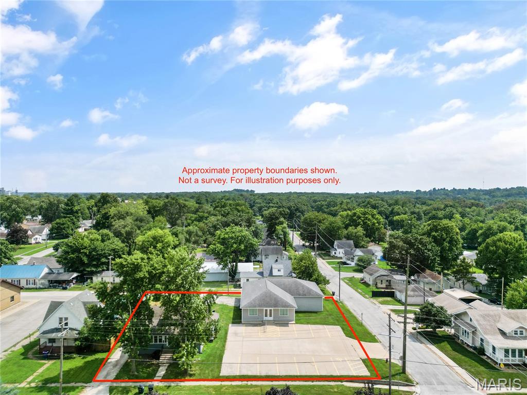Exceptional investment and business opportunity on 1/2 +/- acres! This 3,150+/- square foot commercial building, constructed in 2014 and formerly operated as a dance studio, offers outstanding flexibility for a variety of commercial or potential future residential uses. Situated along highly traveled Illinois State Route 16 with an average daily traffic count of approximately 5,550 vehicles, the property provides excellent visibility and accessibility.
Inside, you'll find two expansive 29' x 39' studio spaces with 10-foot ceilings, a fully accessible entrance, welcoming reception/retail lobby, private office with a walk-in closet, and two restrooms. The full unfinished basement features poured concrete walls, an egress window, roughed-in plumbing for an additional bathroom, and engineered floor joists, providing exceptional storage or future expansion potential.
Additional features include dual HVAC systems, a smart thermostat, energy-efficient LED lighting throughout, and a large concrete parking lot.
Also included in the sale is the adjoining property at 1112 School St., an 816 square foot, 2 bedroom, 1 bath rental home generating $650 per month with a long-term tenant in place since 2019, offering immediate, dependable income. Investors may wish to explore the possibility of obtaining a zoning variance to convert the commercial building into multi-family residential units, subject to municipal approval. Alternatively, the adjoining home could potentially be removed to accommodate additional parking or future site improvements, subject to local regulations.
Whether you're looking to establish or expand your business, invest in an income-producing property, or explore future redevelopment opportunities, this unique property offers exceptional versatility and endless possibilities.