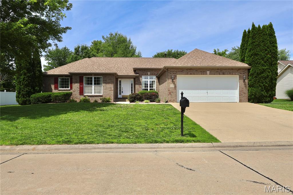 Welcome Home to this beautiful 3 bedroom, split-concept home tucked away on a quiet cul-de-sac in the desirable Manors at Richland Creek.  Designed for comfort and easy living, this property offers low maintenance living paired with timeless style.  Step inside and you will love the gorgeous wood floors that flow throughout the main living spaces.  Features a spacious family room, formal dining room, a separate living room, eat-in kitchen perfect for everyday meals as well as entertaining guest, and a 2-car garage.  The side living room provides more space to entertain and relax.  Don't miss your chance to make this gem your own.