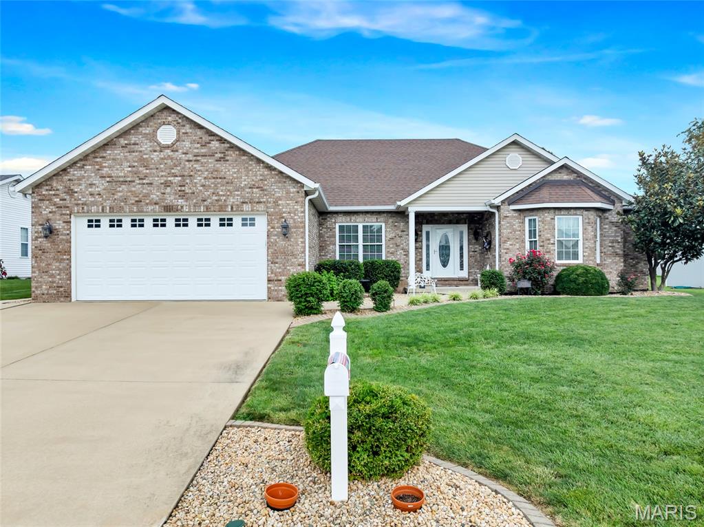 Welcome to this stunning 4 bedroom, 3.5 bathroom home that impresses from the moment you arrive! With its beautiful brick front exterior and thoughtfully manicured landscaping, this property delivers exceptional curb appeal and a warm, welcoming first impression that carries throughout every inch of the home.

Step inside and immediately feel at home in the spacious family room, featuring a soaring vaulted ceiling and a cozy corner fireplace, the perfect gathering spot for family and friends. The well appointed kitchen is sure to impress, boasting a large center island, elegant tile backsplash, and beautiful Pella French doors that open seamlessly to the lovely covered patio. The dedicated dining room provides an elegant setting for meals and gatherings, rounding out the main living area beautifully.

The thoughtfully designed main level also features a primary bedroom suite complete with a private attached bathroom featuring a dual vanity. Two additional bedrooms (one with a charming bay window) and a full hall bathroom provide comfortable accommodations for family and guests. A convenient main level laundry room with an attached half bath adds an extra layer of everyday functionality.

The finished lower level truly expands your living space and possibilities. A massive recreation room provides endless options for entertaining, movie nights, and game days, while a fourth bedroom and full bathroom make this level ideal for guests or a private retreat. A dedicated exercise room/bonus room round out the lower level.

This home has been meticulously maintained and thoughtfully upgraded throughout, featuring a tankless water heater for endless hot water on demand, a backup sump pump for added peace of mind, a water softener, and a carbon filtration system-(rented for $30/month) for exceptional water quality. The HVAC system has been enhanced with a steam humidifier, an air cleaner on the furnace, and an energy recovery ventilator (ERV) that continuously brings fresh air into the home while expelling stale air, ensuring superior indoor air quality year-round. The garage is fully equipped with 220 electric service and hot and cold water, making it a truly functional workspace.

And the extras keep coming, appliances including the refrigerator, washer, and dryer stay with the home, along with all gym equipment, making this one of the most turnkey and thoughtfully appointed properties you will find in Waterloo!

Step outside to the covered patio and enjoy the beautifully landscaped surroundings, the perfect backdrop for relaxing evenings and outdoor gatherings.

With its incredible curb appeal, thoughtful upgrades, exceptional indoor air quality systems, and fantastic finished lower level, this home is a rare and wonderful find in Waterloo.

Broker has written authorization to withhold presentation of any offers until Monday 7/27 @ 9pm with response time of Tuesday 7/28 at 5pm.