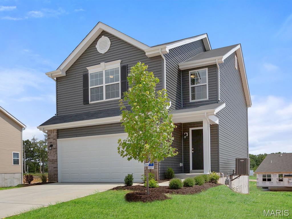 New McBride Burlington 2-story 3BR, 2.5BA home will be move-in ready this summer! The open floor plan is perfect for entertaining, with a spacious living room featuring a ceiling fan, large windows, & wood laminate flooring. The dining area opens to the backyard and flows into the kitchen w/a breakfast bar, Level 4 Brellin White 42” cabinets & stainless-steel GE appliances. The primary suite has a spacious walk-in closet & private bath w/a double vanity, enclosed toilet, linen closet, & 5’ walkin shower. Upstairs has a laundry room, 2 bedrooms w/walk-in closets, and a full bath. Additional features include a main floor powder room, a 2 car garage with coach lights, & white 6-panel interior doors. Regal Pines offers beautiful new homes in Ellisville with convenient access to shopping, dining, parks, and major highways for easy commuting throughout St. Louis County. Enjoy peace of mind with McBride Homes’ 10 year builders warranty & incredible customer service! Similar photos shown.