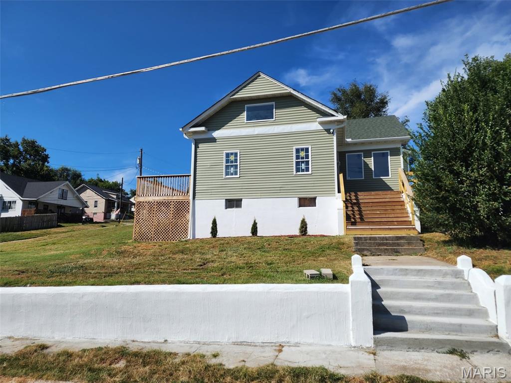 Originally built in 1900, this one-and-a-half story home has been completely gutted and beautifully rehabbed, combining the character of an older home with the comfort and convenience of everything new. Offering 4 bedrooms and 2.5 baths, the thoughtfully designed floor plan features a main-level primary bedroom suite and main-floor laundry for added convenience.

Situated on a corner and spanning two lots, this property offers plenty of outdoor space to enjoy. The large deck is perfect for relaxing, grilling, or entertaining, while off-street parking in the rear provides added convenience.

The basement offers additional storage and usable space. With extensive renovations throughout, this home gives you the charm of a 1900 property without the projects that typically come with an older home. Everything is new - just move in and make it yours!