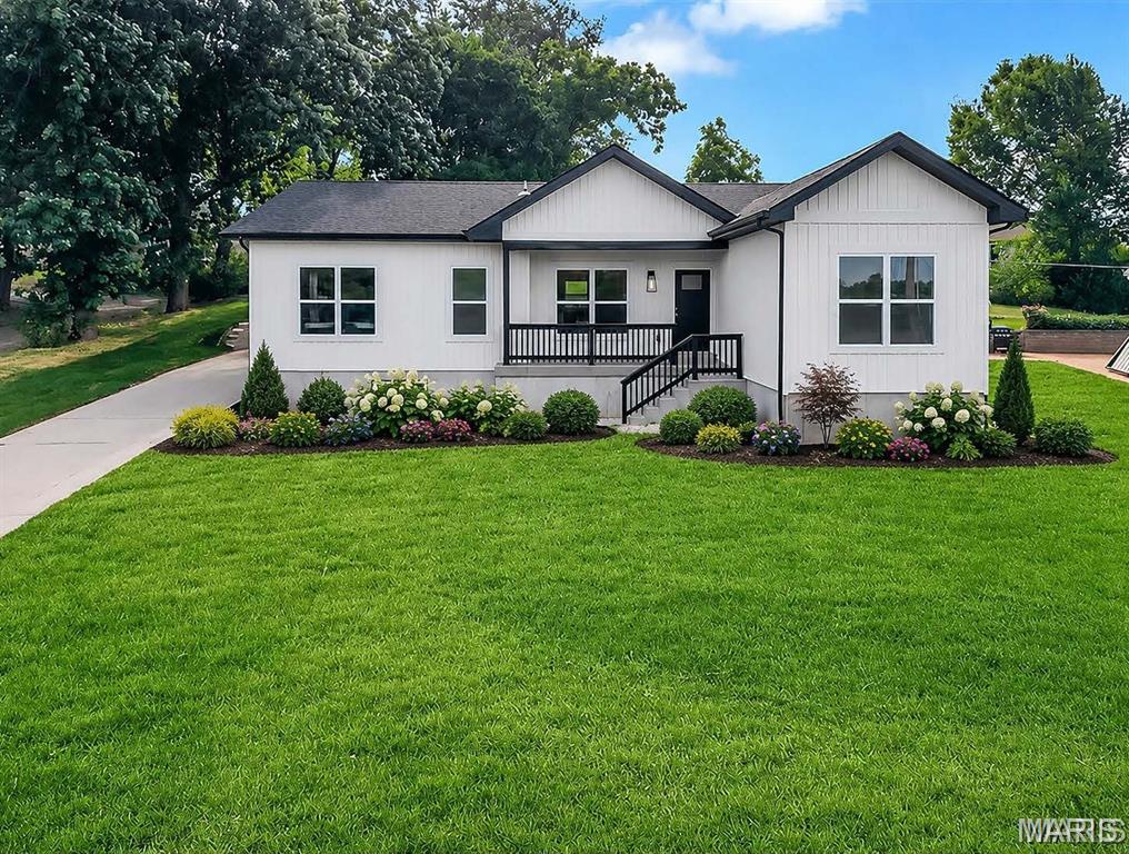 Welcome home to this private Maryland Heights New Construction oasis away from subdivision neighbors! This large lot offers mature trees, a private back yard for entertaining and a scenic view off the front porch. The spacious 3 bed, 2 bath home has a completely open floor plan. High end finishes including wood flooring, custom cabinetry and trim, quartz countertops, and exquisite tile work details the home from top to bottom. An oversized two car pull behind garage provides off street parking and storage with a custom home feel. The full basement with 8' ceilings, a roughed in bathroom and egress window creates an opportunity for nearly 1,500 sq ft of additional living space.   In this neighborhood you are close to Westport, Hwy 40 and 270 and many other amenities. Seller offering a $3,500 landscaping allowance!  Do not miss out on this stellar opportunity. Owner Agent