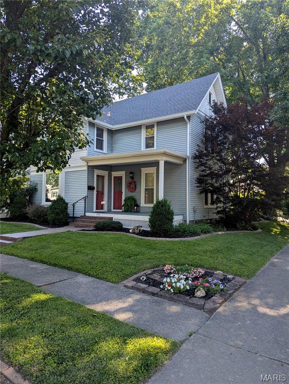 Meticulously maintained and filled with timeless character, this welcoming 3-bedroom, 2-bath historic home offers the perfect blend of charm, comfort, and thoughtful updates.

From the moment you step inside, you'll notice the details that make older homes so special: original wood floors, soaring ceilings, crown moldings, spacious rooms, and a sense of craftsmanship that's increasingly hard to find. At the same time, the home feels comfortable and easy to live in, thanks to years of careful maintenance and smart improvements.

The flexible floor plan includes a main-level den with an adjacent, newly remodeled 3/4 bath. This recent project was completed with high-end fixtures, and was designed specifically to be wheelchair-friendly. Whether you need a family room, home office, guest space, or even a potential main floor/fourth bedroom, the layout easily adapts to your needs.

The kitchen is both beautiful and functional, featuring stunning granite countertops and backsplash, stainless steel appliances, a large pantry, a center island, and a cozy breakfast nook. The parquet flooring in the kitchen and dining room adds warmth and character, while gatherings large and small will feel right at home in the bright and light dining area.

Practical features abound, including a new roof (2025), replacement vinyl windows, dual-zoned HVAC, a furnace less than five years old, and a basement laundry with the washer and dryer included (and elevated for ease of use). Storage is plentiful, with generous space in both the basement and attic. A portion of the attic even features tongue-and-groove flooring beneath the insulation.

The true showstopper is the backyard. Tucked behind a full fence (perfect for your fur babies), this enchanting outdoor space feels like a hidden retreat, offering a sense of peace the moment you step outside. Whether you're sipping coffee on the patio, listening to the gentle sounds of the koi pond, or admiring the vibrant and textured landscaping, every corner invites you to relax and stay awhile. With a built-in irrigation system, a 10x12 shed with electricity, and landscaping designed to be enjoyed rather than endlessly maintained, it delivers all the serenity of a private garden sanctuary without demanding all of your weekends.

This is the kind of home that doesn't come along often. Lovingly cared for, thoughtfully updated, and truly move-in ready, it offers not only beautiful spaces but also the confidence that comes from exceptional pride of ownership. Interior photos and 3D tour coming soon...