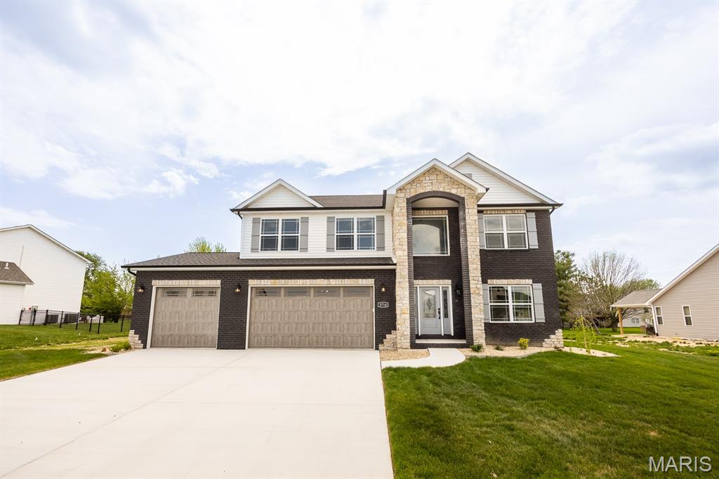 JUST COMPLETED!! The Tucker floor plan by CNR Homes offers nearly 4,000 sq. ft. of beautifully finished living space with 5 bedrooms, 3.5 bathrooms, a finished basement, and a finished 3-car garage. Thoughtfully designed with both luxury and functionality in mind, this home features an open-concept layout filled with spacious living areas and upgraded finishes throughout. The chef-inspired kitchen showcases a large center island, abundant cabinetry, and an oversized walk-in pantry, all seamlessly opening to the main living space—perfect for entertaining and everyday living.

Upstairs, the impressive primary suite serves as a true retreat with generous proportions, a spa-like bathroom, and an expansive walk-in closet. The additional bedrooms offer ample space and storage, creating comfort and flexibility for family or guests.

The finished basement expands the home’s living and recreation space, while the covered patio provides the perfect place to relax and enjoy outdoor living. Located in The Summit of Shiloh, this home combines luxury finishes, exceptional space, and a highly desirable location.