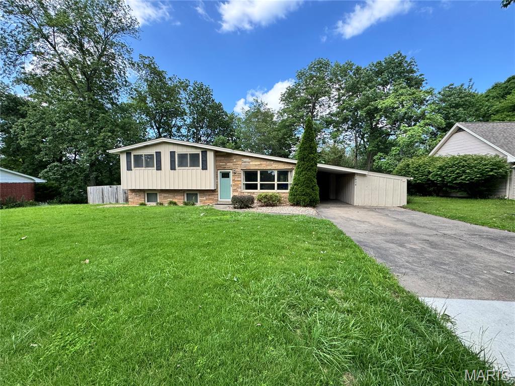 Welcome to this beautiful tri-level home located in the Alma Schrader School District! Step inside to find a warm and inviting living room featuring hardwood floors and plenty of natural light. Just beyond, the updated kitchen with white cabinetry, concrete countertops, stainless steel appliances, and a spacious pantry for all your storage needs. Upstairs, you'll find three bedrooms and a full hall bathroom. The expansive primary suite serves as a private retreat, complete with its own bathroom featuring a tiled steam shower.

The lower level offers even more living space with a large family room, a full bathroom, and a convenient laundry area.

Off the dining room, you'll discover an impressive sunroom with over 300 square feet of additional living space. Floor-to-ceiling windows fill the room with natural light, creating the perfect setting for entertaining, enjoying your morning coffee, or simply unwinding year-round.

Step outside to the backyard, where a black chain-link fence provides a secure space for pets, play, and outdoor enjoyment. With multiple living areas, thoughtful updates, and plenty of room to spread out, this home is ready for its next owner.