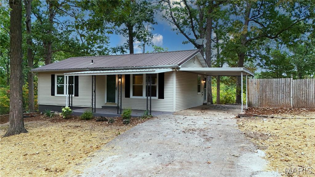 Welcome home to Sunrise Lake! This charming 2-bedroom, 1-bath home sits on approximately .54 acre with a fully fenced yard, offering plenty of outdoor space in a peaceful lake community. Step inside to find beautiful hardwood floors, complemented by new carpeting and updated light fixtures for a fresh, move-in-ready feel. Even better, many of the big-ticket items have already been taken care of, including a new septic system, new windows, new HVAC system, freshly updated bathroom and new water heater! Whether you're looking to simplify, purchase your first home, or simply enjoy the perks of lake-community living, this adorable home packs a lot into an affordable package. Come see what Sunrise Lake living has to offer!