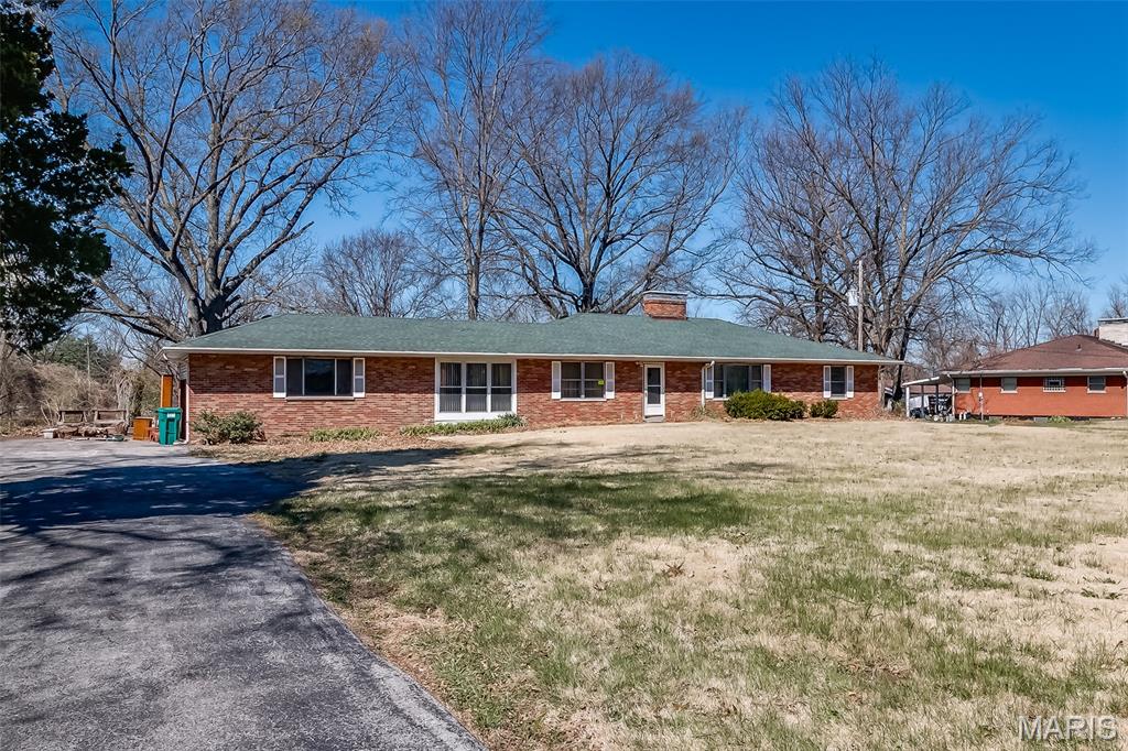 Fabulous full brick 3 bedroom 2 bath  ranch home waiting for some TLC.  This is an incredibly large lot and this home has endless possibilities!  Seller is selling AS IS and will do no repairs, warranty or inspections.  Please submit offers on a special sales contract with proof of funds. Please do your due diligence prior to submitting an offer.