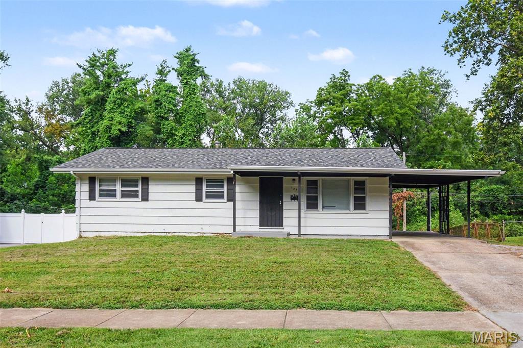 Welcome home to this charming 3-bedroom, 1-bath residence offering comfortable living and endless potential! Step inside to find a bright and inviting layout with spacious living areas and a partially finished basement, providing the perfect space for a family room, home office, fitness area, or hobby room while still offering additional storage.

Outside, enjoy the convenience of a covered carport and a level backyard that backs to mature woods, creating a peaceful setting with added privacy. Whether you're relaxing outdoors, entertaining guests, or enjoying nature, this backyard offers plenty of room to make it your own.

Conveniently located near shopping, dining, parks, and major roadways, this home is an excellent opportunity for first-time buyers, those looking to downsize, or investors seeking a property with great potential. Schedule your private showing today!