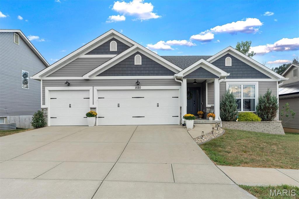 Welcome Home! 4-bedroom, 3-bath ranch with 2,485 sq ft of finished living space, tucked on a cul-de-sac lot that adjoins a wooded area in the Dunklin R-V school district. Living room features luxury vinyl plank flooring, electric fireplace & ample space for gathering. Breakfast room opens to the kitchen, which offers custom cabinetry, pantry, breakfast bar & all appliances included. Primary suite has carpeting, ceiling fan & ensuite bath with ceramic tile & walk-in closet. Two additional bedrooms & full bath also complete the main level. Effortless living continues with main floor laundry & oversized 3-car garage. Finished lower level showcases two recreation rooms, office, full bath, bedroom & exercise/storage room, plus a second fireplace. Spacious deck off of the breakfast room and a walk out to a patio. This home blends modern updates with comfortable, functional living. Don't miss out on this one!