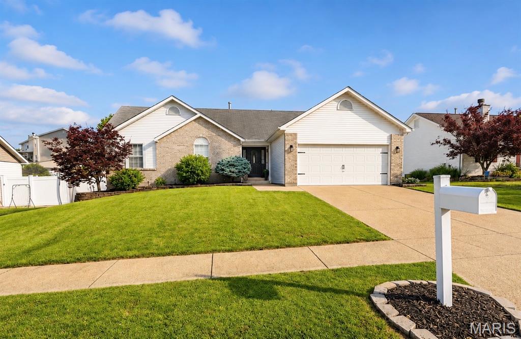 You are going to love it as soon as you walk in! Owners have completely updated this home in the last few years. Open floor plan with vaulted ceilings in the family room and kitchen. Updated kitchen with newer cabinets, countertops, sink, faucet and appliances. All new lvp flooring throughout the home. Newer lighting and ceiling fans in bedrooms, family room and kitchen. Both bathrooms have been updated with new toilets, vanities, faucets and lighting. Wood burning fireplace. Full basement ready to be finished. Fenced yard and deck with all new landscaping. Newer garage door opener. Furnace, ac and roof have been replaced in the last 10 years.