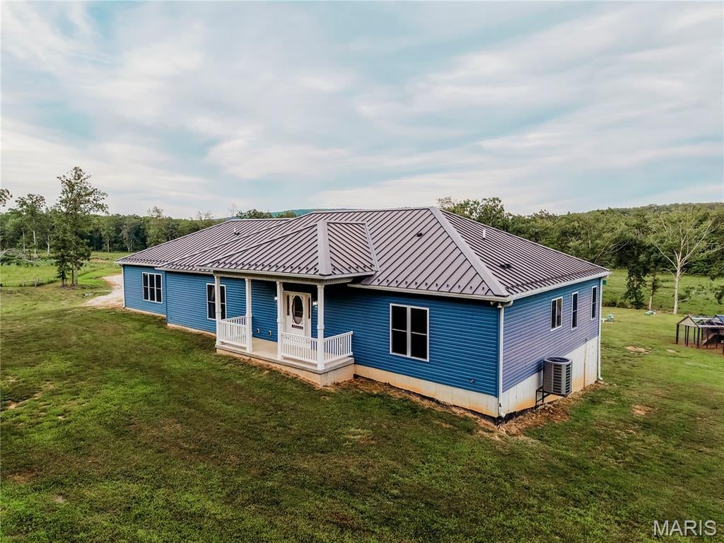 Discover the possibilities on this expansive farm featuring over 150 acres of beautiful land and a well maintained 4-bedroom, 3-full-bath home. Built in 2017, the approximately 2,400 sq. ft. single level residence offers modern comfort with plenty of room for family and entertaining. The spacious floor plan also provides a full unfinished walk-out basement ready for you to make it your own. This homestead has a great blend of functionality and convenience. With over 150 acres you can farm, run livestock in the 65+/- acres of fenced land, hunt, cut timber, or simply enjoy the peace and privacy of country living. A rare combination of acreage, a newer home, and a secondary residence with endless potential-this farm is ready for its next chapter!