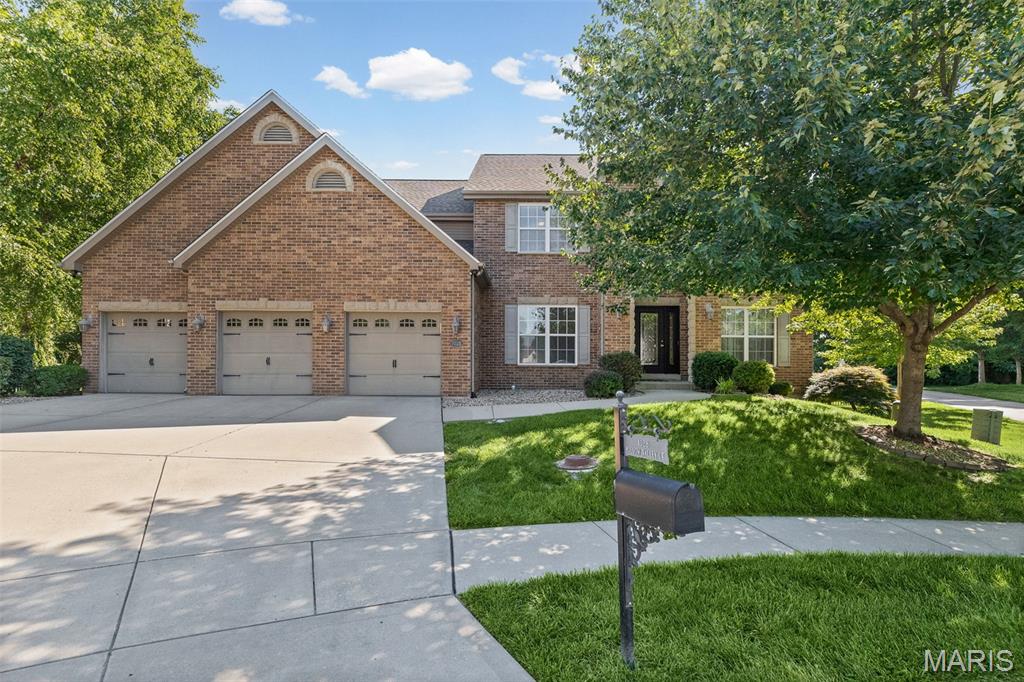 Welcome Home to this Gorgeous 2-story retreat offering over 4,700 Sq Ft of Beautifully designed living space on a Spacious .68-acre cul-de-sac lot w/Stunning Lake views! Featuring 5 Bdrms & 5 Bths. This Exceptional Home is loaded w/Amenities, Updates, & room to entertain both inside & out! Step inside to find Gleaming Wood floors throughout much of the main level, Newer Luxury Vinyl Plank flooring (2021), Fresh paint in select areas, & an Impressive Great Room highlighted by Crown Molding, Lake View, & a cozy Fireplace! The Inviting Kitchen is a Chef’s Dream, boasting High-end Stainless Steel Appliances, Double Built-in Ovens, Gas cooktop, in 2023 Refrigerator, Dishwasher, Microwave were Updated, Granite Countertops, Tile backsplash, Center Island w/Prep sink, Staggered Cabinetry, Planning desk, Walk-in Pantry & Butler’s Pantry. The adjoining Breakfast area features a Bay Slider leading to the Covered 22’ x 12’ Composite Deck w/2 Ceiling Fans (2023), creating the Perfect Space for morning coffee or evening relaxation while taking in the Peaceful Lake setting! The Main level also offers a Formal Dining Rm w/tray ceiling, for special gatherings & a Formal Living Rm that provides flexible space for a home office, sitting room, playroom, or whatever best suits your lifestyle! The Luxurious Primary Suite is a true retreat w/a Vaulted ceiling, Elegant Arched entry into the Sitting room w/Fireplace, an impressive 12’ x 10’ Walk-in closet, & a Spa-like Bath complete w/Dual vanities, separate Soaking tub, & Walk-in shower! Upstairs, additional Bedrooms offer Generous space, including Walk-in closets, a Jack-and-Jill Bath, & Junior Ensuite w/private Bath! The Finished Walk-out lower level w/9 ft pour expands your living space w/a Large Family Room, Recreation area w/Pool Table, Wet bar featuring a Wine refrigerator & Bar Stools that stay! Step outside to the Stone Patio & enjoy the Peaceful Lake View, Beautifully Landscaped Fenced Backyard complete w/Landscape rock, Irrigation system (which is also in the front yard), Fruit trees, & a backyard Fire pit perfect for gathering with family & friends!  An additional Bedroom, Full bath, Bonus Area, & two storage rooms complete the lower level! Additional Highlights include a Main-floor Laundry Rm with Shelving, Folding table, Utility sink, & Washer/Dryer (2025) that stay with the home! Dual Furnaces and A/C systems, A/C updated 2023, a New Roof (2025), & an Oversized 3-car garage. Located in O’Fallon School District, this Remarkable Property offers the Perfect combination of Luxury, Comfort, Functionality, & Outdoor Enjoyment. A Rare Opportunity to Own a truly Exceptional Home with Breathtaking Views & Endless Amenities!