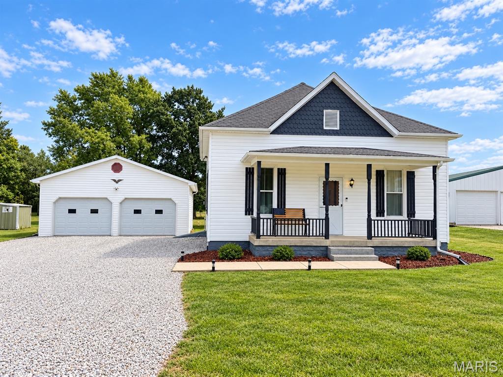 Cute, charming, and move-in ready! 

This adorable 2-bedroom, 1-bath home has had several updates and offers so much to love. Situated on a spacious large lot, there’s plenty of room to enjoy the outdoors. Relax on the inviting front porch or spend your evenings on the cute covered back porch, perfect for morning coffee, grilling, or unwinding at the end of the day. The property also features a detached 2-car garage with plenty of room for parking and storage. With its great curb appeal, generous yard, updates, and welcoming outdoor spaces, this home would make a wonderful starter home, downsizing option, or investment property.