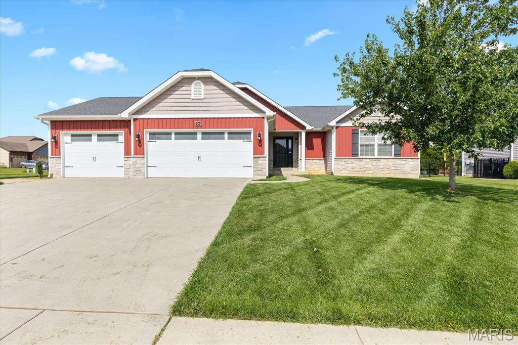 Welcome home to this beautifully maintained 4 bed, 3 full bath home offering nearly 2,000 sq ft of stylish and functional living space! Built in 2015, this home features neutral paint and durable luxury vinyl flooring throughout the main living areas, creating a warm and inviting feel. The eat-in kitchen shines with granite countertops, stainless steel appliances, a breakfast bar, pantry, and extensive crown molding. The spacious primary suite boasts a vaulted beamed ceiling, walk-in closet, and private bath. The updated hall bath includes ceramic tile flooring, custom tile tub/shower, and an adult-height vanity with granite. The finished lower level offers incredible additional living space with a deep pour, wet bar, rec room with fireplace, wet bar, full bath, and a flexible sleeping or office area. Enjoy practical upgrades like an inground sprinkler system, sump pump, and a 3-car garage with a large bump-out for extra storage. This move-in ready home checks all the boxes!